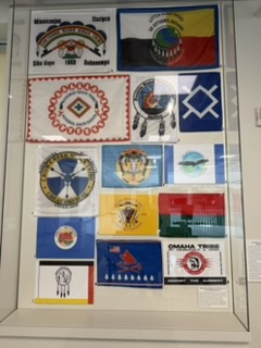 Native American tribal flags on display