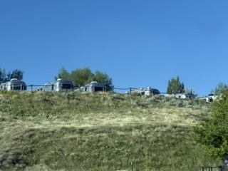 Airstreamers still in camp as we pull out