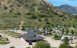 Campground with small vacation rental trailers near the building