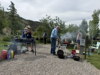 Campers gathered for the Dutch Oven dinner