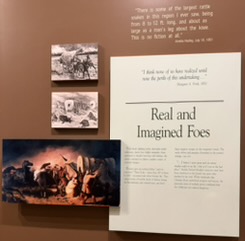 Interpretive Center display about emigrants and Native people