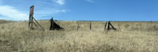 Fencepost with rocks in eastern Oregon