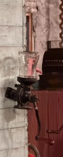 Old nut grinder and chocolates in the underground ice cream parlor