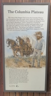 The Columbia Plateau Oregon Trail sign at a rest stop