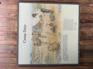 Camp Duty Oregon Trail sign at a rest stop