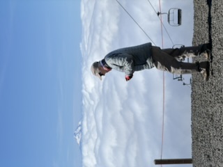 Skiers on manufactured snow at Timberline Lodge
